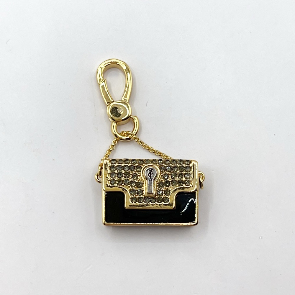 Juicy Couture black purse with lipstick charm